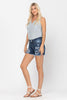 Curvy Olivia Mid-Rise Patch Cut Off Shorts by Judy Blue