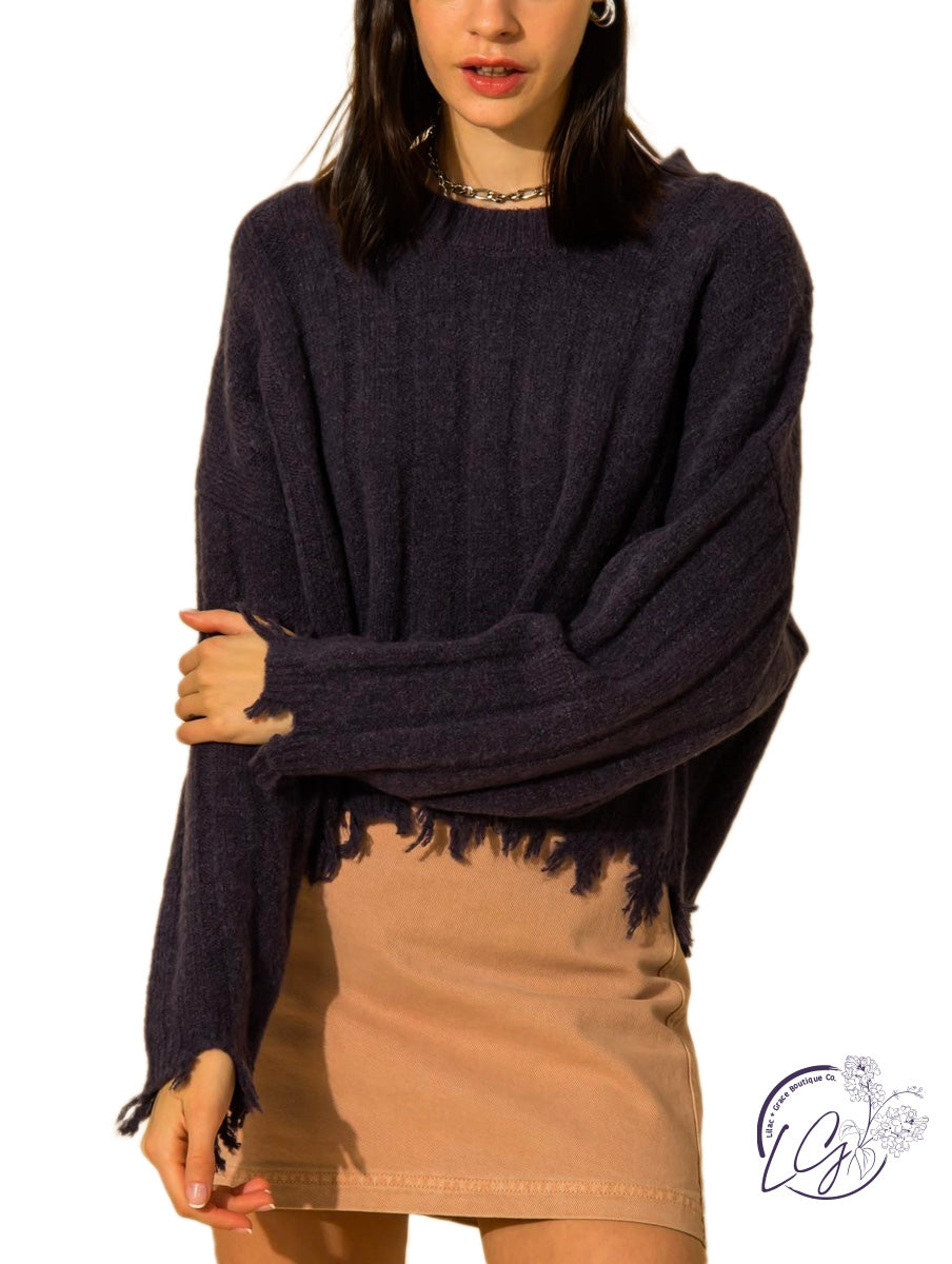 Kind hearted rib-knit frayed hem sweater.